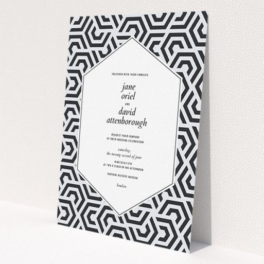 A personalised wedding invitation template titled 'Geometric corners'. It is an A5 invite in a portrait orientation. 'Geometric corners' is available as a flat invite, with tones of black and white.