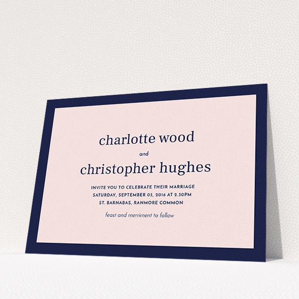 A personalised wedding invitation design titled "Laydown simple". It is an A5 invite in a landscape orientation. "Laydown simple" is available as a flat invite, with tones of navy blue and pink.