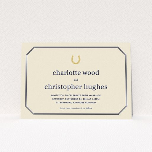 A personalised wedding invitation named "Lucky horse shoe". It is an A5 invite in a landscape orientation. "Lucky horse shoe" is available as a flat invite, with tones of cream and gold.