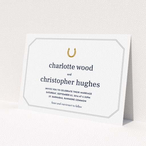 A personalised wedding invitation design called 'Lucky horse shoe'. It is an A5 invite in a landscape orientation. 'Lucky horse shoe' is available as a flat invite, with tones of white, gold and grey.