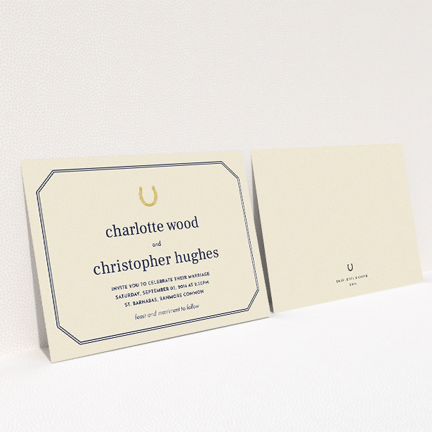 A personalised wedding invitation named "Lucky horse shoe". It is an A5 invite in a landscape orientation. "Lucky horse shoe" is available as a flat invite, with tones of cream and gold.