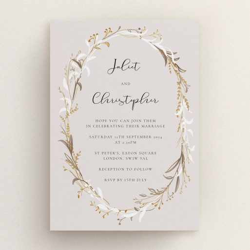 A personalised wedding invitation design called "Metallic Wreath". It is an A5 invite in a portrait orientation. "Metallic Wreath" is available as a flat invite, with tones of dark cream and gold.