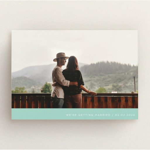 A personalised wedding invitation design named "Mint Bottom Simple". It is an A5 invite in a landscape orientation. It is a photographic personalised wedding invitation with room for 1 photo. "Mint Bottom Simple" is available as a flat invite, with mainly green colouring.