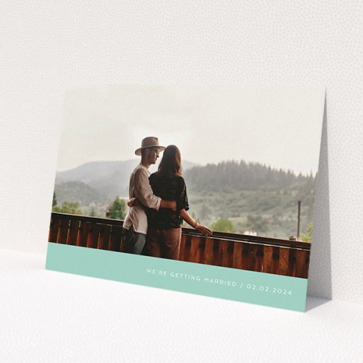 A personalised wedding invitation design named 'Mint Bottom Simple'. It is an A5 invite in a landscape orientation. It is a photographic personalised wedding invitation with room for 1 photo. 'Mint Bottom Simple' is available as a flat invite, with mainly green colouring.