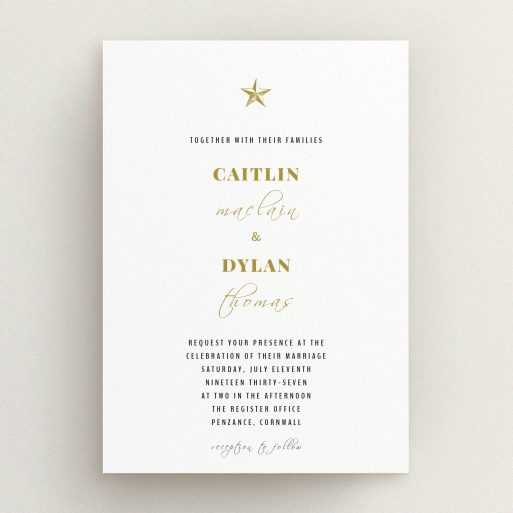 A personalised wedding invitation called "North Star". It is an A5 invite in a portrait orientation. "North Star" is available as a flat invite, with tones of white and gold.