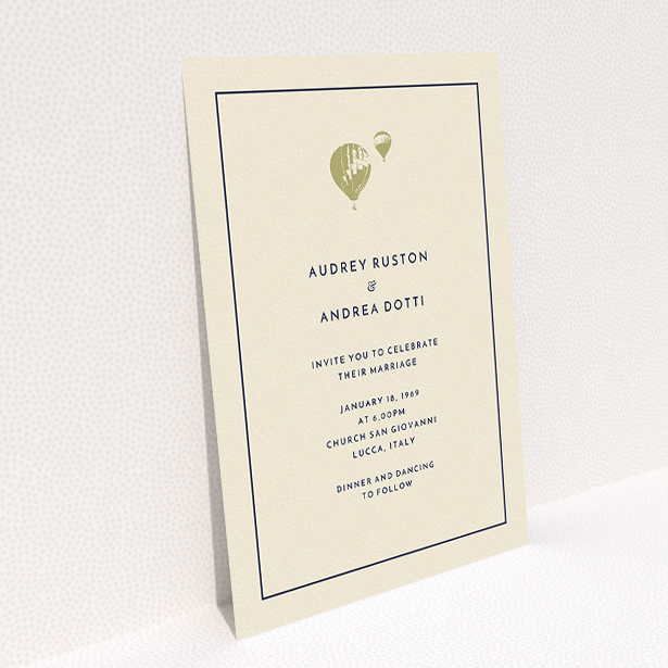 A personalised wedding invitation design titled "Off and away". It is an A5 invite in a portrait orientation. "Off and away" is available as a flat invite, with tones of cream and gold.