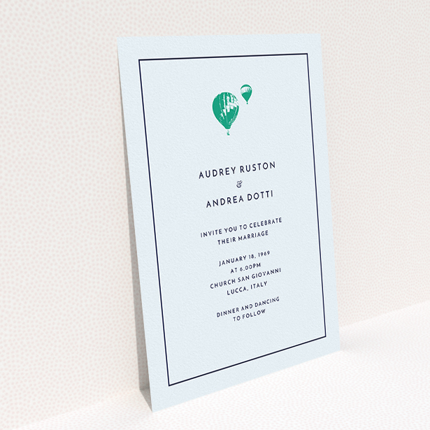 A personalised wedding invitation called "Off and away". It is an A5 invite in a portrait orientation. "Off and away" is available as a flat invite, with mainly white colouring.