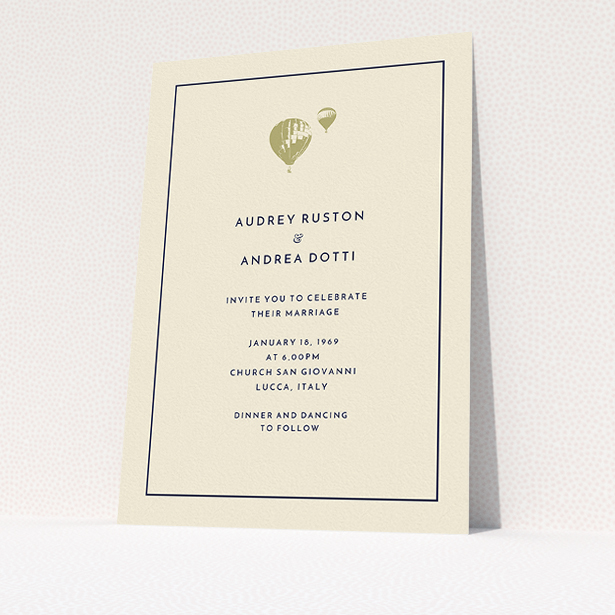 A personalised wedding invitation design titled "Off and away". It is an A5 invite in a portrait orientation. "Off and away" is available as a flat invite, with tones of cream and gold.