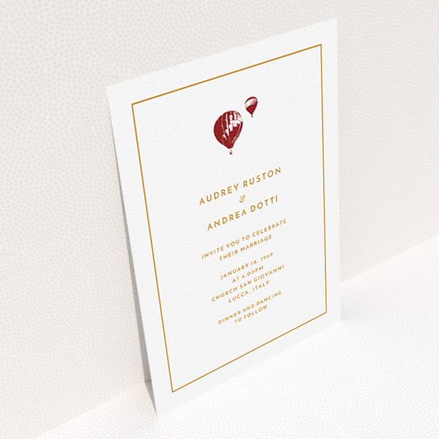 A personalised wedding invitation design called "Off and away". It is an A5 invite in a portrait orientation. "Off and away" is available as a flat invite, with tones of white and orange.