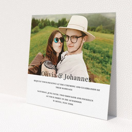 A personalised wedding invitation design called 'On the fence'. It is a square (148mm x 148mm) invite in a square orientation. It is a photographic personalised wedding invitation with room for 1 photo. 'On the fence' is available as a flat invite, with mainly white colouring.
