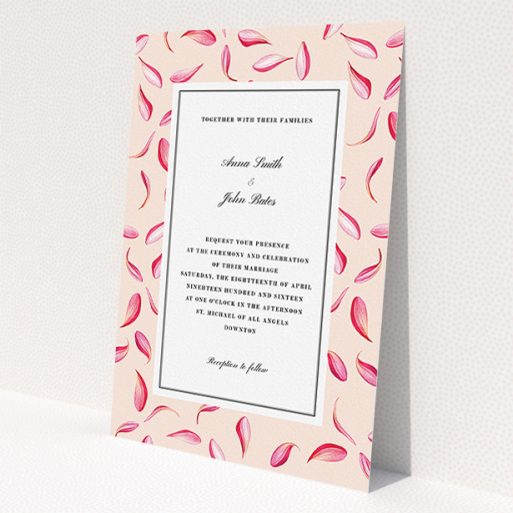A personalised wedding invitation design called 'Petal avalanche'. It is an A5 invite in a portrait orientation. 'Petal avalanche' is available as a flat invite, with tones of pink, red and white.