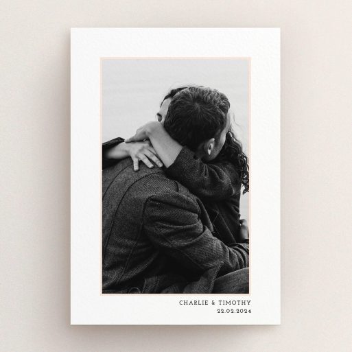 A personalised wedding invitation design called "Photo Centre". It is an A5 invite in a portrait orientation. It is a photographic personalised wedding invitation with room for 1 photo. "Photo Centre" is available as a flat invite, with tones of white and pink.