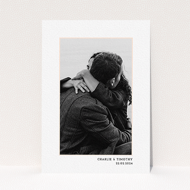 A personalised wedding invitation template titled "Photo Centre". It is an A6 invite in a portrait orientation. It is a photographic personalised wedding invitation with room for 1 photo. "Photo Centre" is available as a flat invite, with tones of white and pink.