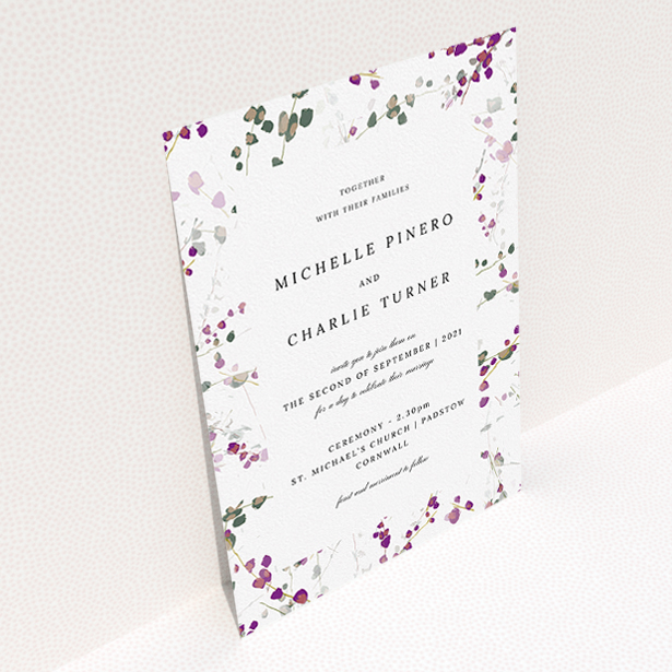 A personalised wedding invitation called "Purple Lupine". It is an A5 invite in a portrait orientation. "Purple Lupine" is available as a flat invite, with tones of purple, pink and dark green.
