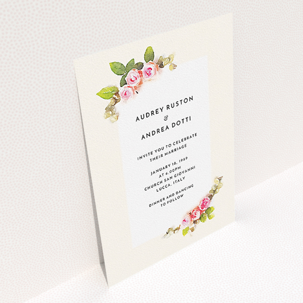 A personalised wedding invitation design titled "Roses on the corner". It is an A5 invite in a portrait orientation. "Roses on the corner" is available as a flat invite, with tones of pink, green and cream.
