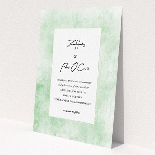 A personalised wedding invitation design named 'Rustic Green'. It is an A6 invite in a portrait orientation. 'Rustic Green' is available as a flat invite, with tones of green and white.