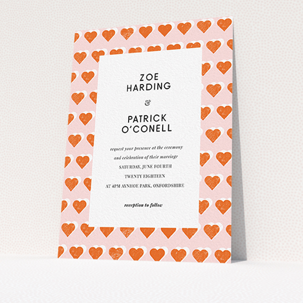 A personalised wedding invitation design called "Rustic Hearts". It is an A6 invite in a portrait orientation. "Rustic Hearts" is available as a flat invite, with tones of pink and orange.