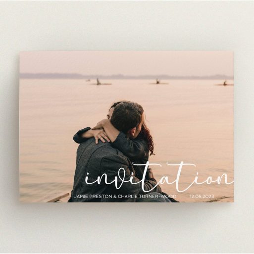 A personalised wedding invitation design titled "Salamanca". It is an A5 invite in a landscape orientation. It is a photographic personalised wedding invitation with room for 1 photo. "Salamanca" is available as a flat invite, with mainly white colouring.