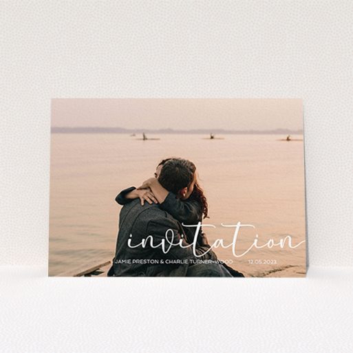 A personalised wedding invitation design called "Salamanca". It is an A6 invite in a landscape orientation. It is a photographic personalised wedding invitation with room for 1 photo. "Salamanca" is available as a flat invite, with mainly white colouring.