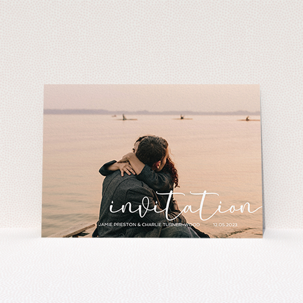 A personalised wedding invitation design called "Salamanca". It is an A6 invite in a landscape orientation. It is a photographic personalised wedding invitation with room for 1 photo. "Salamanca" is available as a flat invite, with mainly white colouring.
