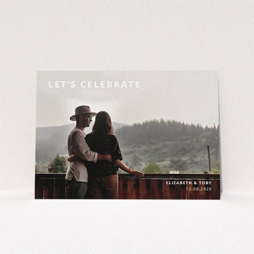 A personalised wedding invitation template titled "Sans Serif". It is an A6 invite in a landscape orientation. It is a photographic personalised wedding invitation with room for 1 photo. "Sans Serif" is available as a flat invite, with mainly white colouring.