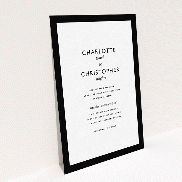 A personalised wedding invitation called "Script switch". It is an A5 invite in a portrait orientation. "Script switch" is available as a flat invite, with tones of black and white.