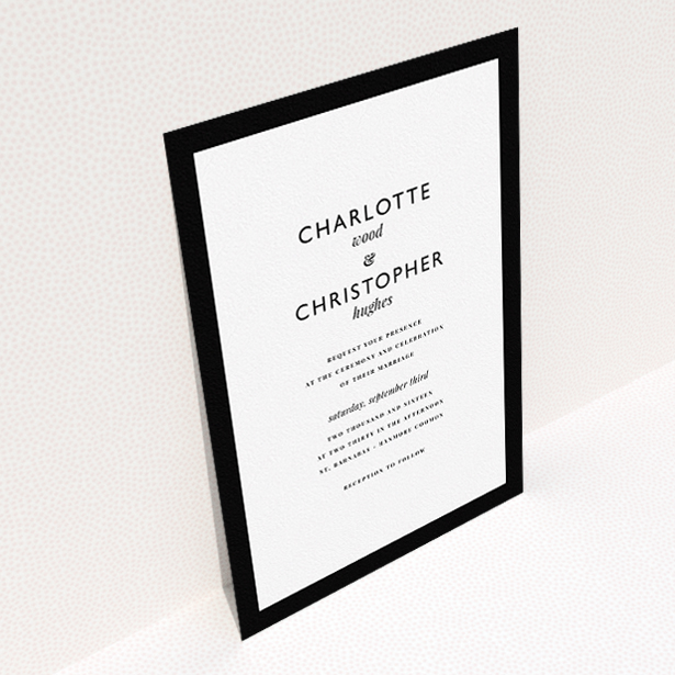 A personalised wedding invitation called "Script switch". It is an A5 invite in a portrait orientation. "Script switch" is available as a flat invite, with tones of black and white.