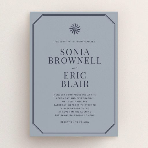 A personalised wedding invitation called "Shaded sundial". It is an A5 invite in a portrait orientation. "Shaded sundial" is available as a flat invite, with tones of dark grey and navy blue.