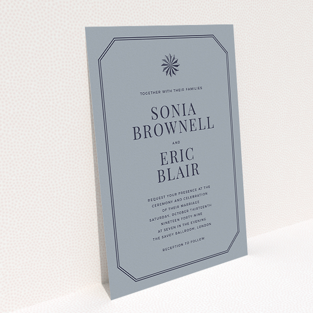 A personalised wedding invitation called "Shaded sundial". It is an A5 invite in a portrait orientation. "Shaded sundial" is available as a flat invite, with tones of dark grey and navy blue.