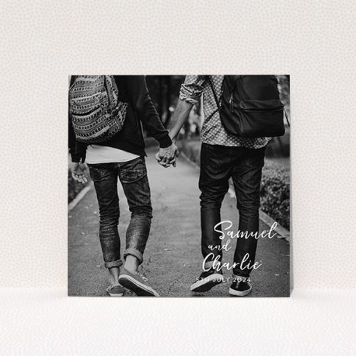 A personalised wedding invitation design named "Soho Script". It is a square (148mm x 148mm) invite in a square orientation. It is a photographic personalised wedding invitation with room for 1 photo. "Soho Script" is available as a flat invite, with mainly white colouring.