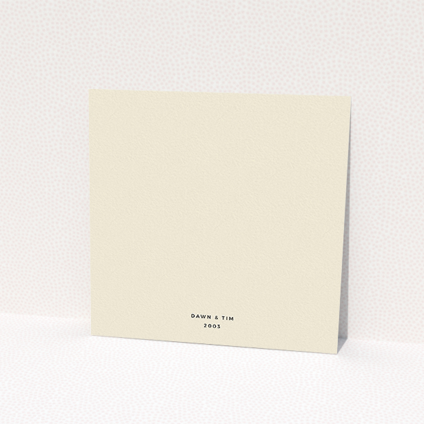 A personalised wedding invitation named "Square slant". It is a square (148mm x 148mm) invite in a square orientation. "Square slant" is available as a flat invite, with tones of cream and navy blue.