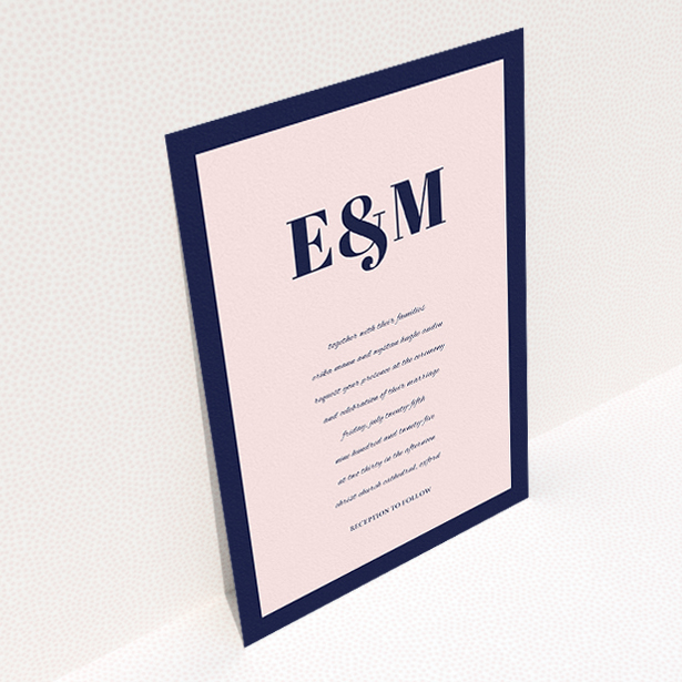 A personalised wedding invitation called "Take on the sides". It is an A5 invite in a portrait orientation. "Take on the sides" is available as a flat invite, with tones of navy blue and pink.