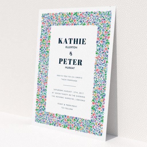 A personalised wedding invitation called 'The faraway garden'. It is an A5 invite in a portrait orientation. 'The faraway garden' is available as a flat invite, with tones of white, blue and green.