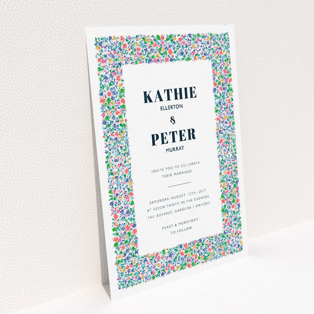 A personalised wedding invitation called "The faraway garden". It is an A5 invite in a portrait orientation. "The faraway garden" is available as a flat invite, with tones of white, blue and green.