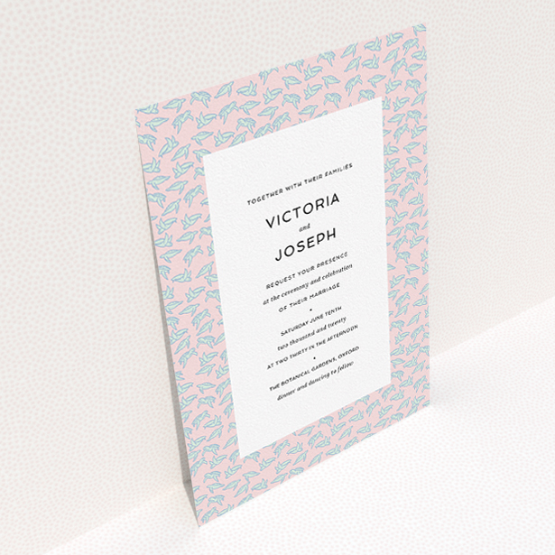 A personalised wedding invitation design named "Tiny, Tiny Turtles". It is an A5 invite in a portrait orientation. "Tiny, Tiny Turtles" is available as a flat invite, with tones of blue and pink.