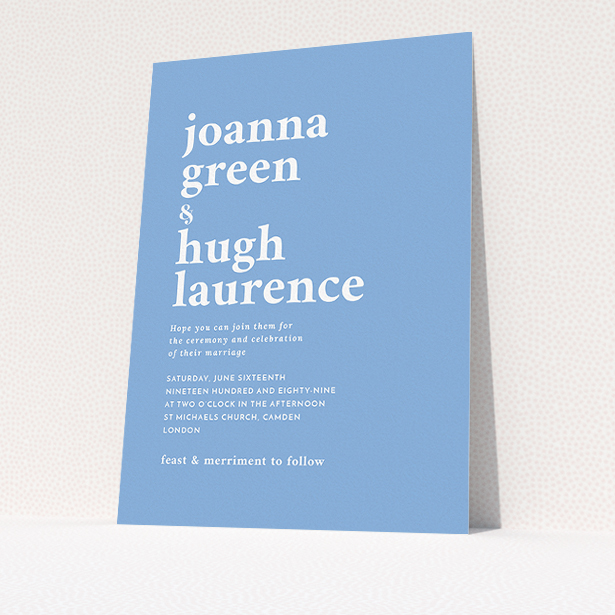 A personalised wedding invitation called "To the left". It is an A5 invite in a portrait orientation. "To the left" is available as a flat invite, with tones of blue and white.