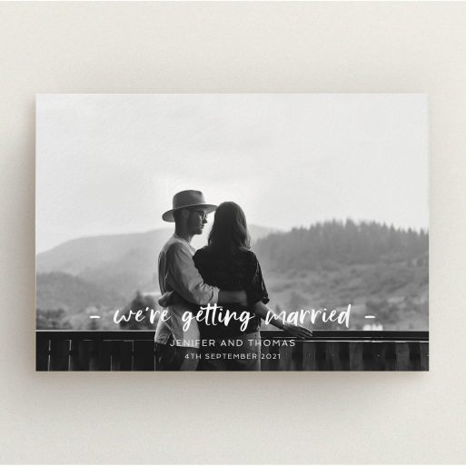 A personalised wedding invitation named "To the Point". It is an A5 invite in a landscape orientation. It is a photographic personalised wedding invitation with room for 1 photo. "To the Point" is available as a flat invite, with mainly white colouring.