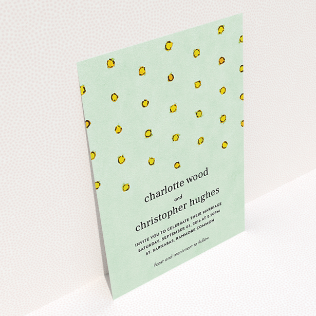 A personalised wedding invitation design named "Turquoise polkadots". It is an A5 invite in a portrait orientation. "Turquoise polkadots" is available as a flat invite, with tones of green and yellow.