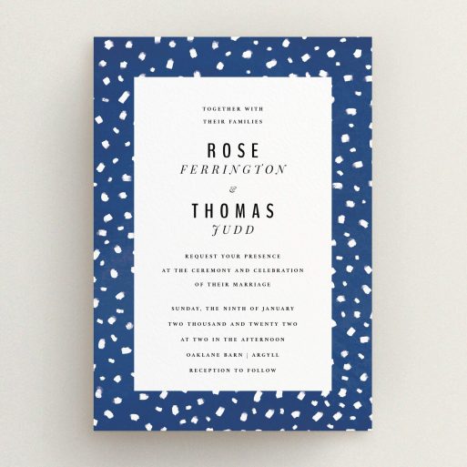 A personalised wedding invitation design called "White dots". It is an A5 invite in a portrait orientation. "White dots" is available as a flat invite, with tones of blue and white.
