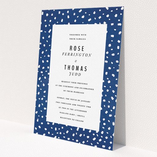 A personalised wedding invitation design called 'White dots'. It is an A5 invite in a portrait orientation. 'White dots' is available as a flat invite, with tones of blue and white.