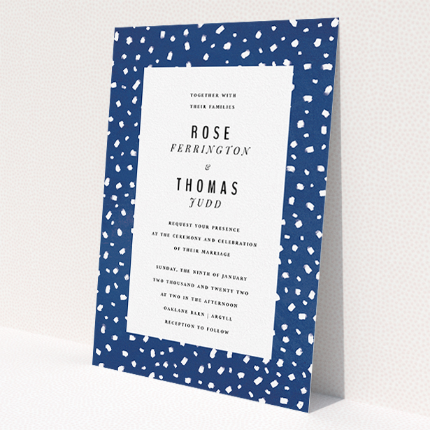 A personalised wedding invitation design called "White dots". It is an A5 invite in a portrait orientation. "White dots" is available as a flat invite, with tones of blue and white.