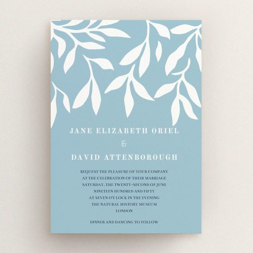 A personalised wedding invitation called "Winter bloom". It is an A5 invite in a portrait orientation. "Winter bloom" is available as a flat invite, with tones of blue and white.