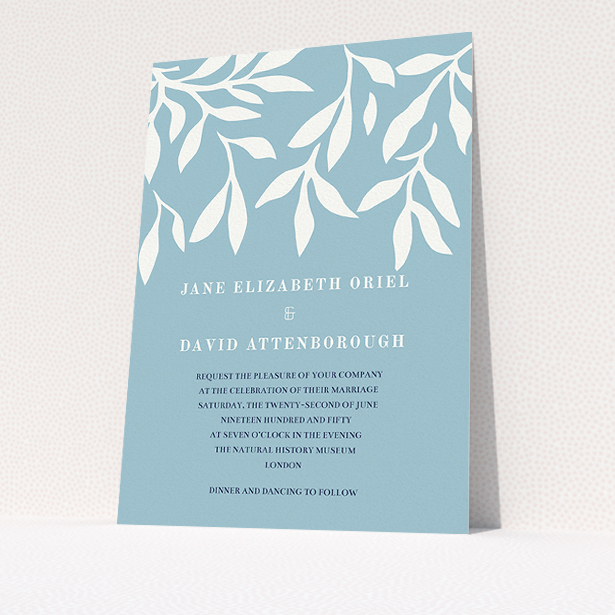 A personalised wedding invitation called "Winter bloom". It is an A5 invite in a portrait orientation. "Winter bloom" is available as a flat invite, with tones of blue and white.