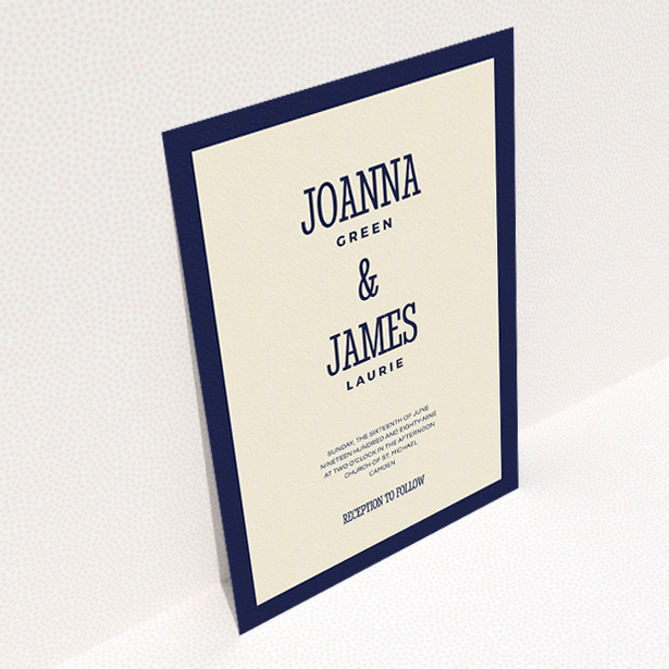 A personalised wedding invite design named "Bold border". It is an A5 invite in a portrait orientation. "Bold border" is available as a flat invite, with tones of cream and navy blue.