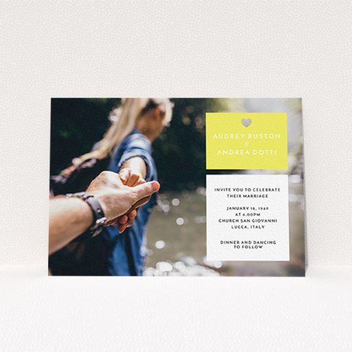A personalised wedding invite called "Boxed In". It is an A6 invite in a landscape orientation. It is a photographic personalised wedding invite with room for 1 photo. "Boxed In" is available as a flat invite, with mainly yellow colouring.