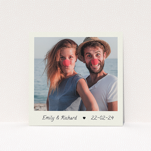 A personalised wedding invite design called "By Hand". It is a square (148mm x 148mm) invite in a square orientation. It is a photographic personalised wedding invite with room for 1 photo. "By Hand" is available as a flat invite, with mainly cream colouring.