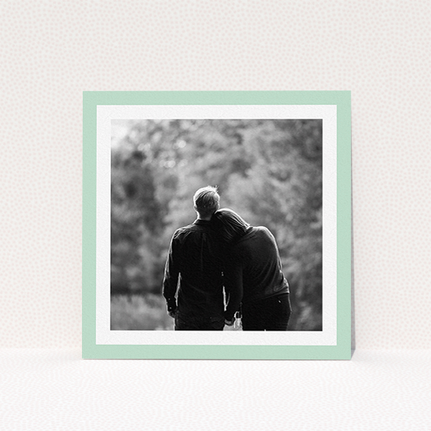 A personalised wedding invite design named "Classic Mint Photo Frame". It is a square (148mm x 148mm) invite in a square orientation. It is a photographic personalised wedding invite with room for 1 photo. "Classic Mint Photo Frame" is available as a flat invite, with tones of green and white.