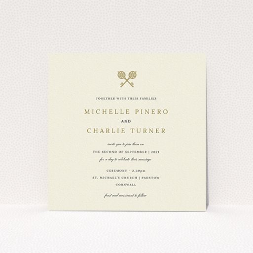 A personalised wedding invite design named "Cross Keys". It is a square (148mm x 148mm) invite in a square orientation. "Cross Keys" is available as a flat invite, with tones of cream and gold.