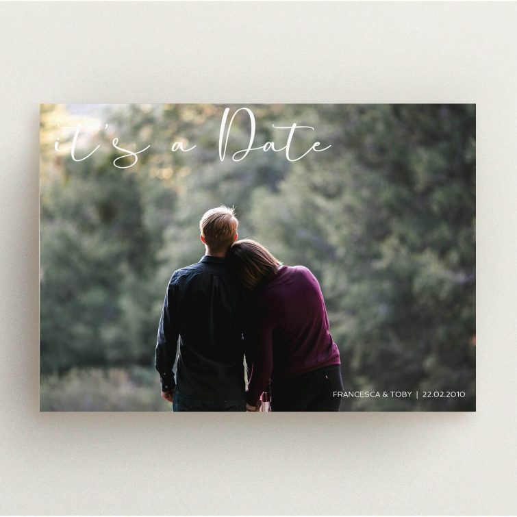 A personalised wedding invite named "Koh Tao". It is an A5 invite in a landscape orientation. It is a photographic personalised wedding invite with room for 1 photo. "Koh Tao" is available as a flat invite, with mainly white colouring.