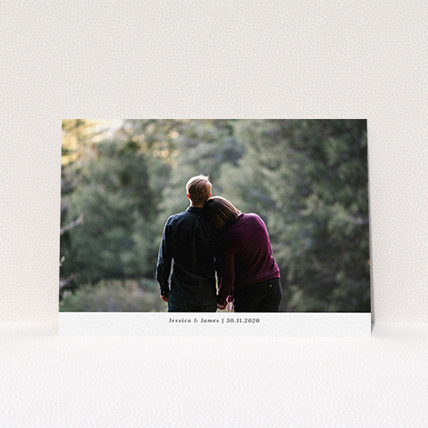A personalised wedding invite template titled "Landscape Photo". It is an A6 invite in a landscape orientation. It is a photographic personalised wedding invite with room for 1 photo. "Landscape Photo" is available as a flat invite, with mainly white colouring.